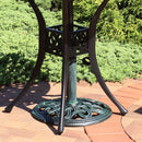 Sunnydaze 17-Inch Round Cast Iron Patio Umbrella Base Green lifestyle outdoor