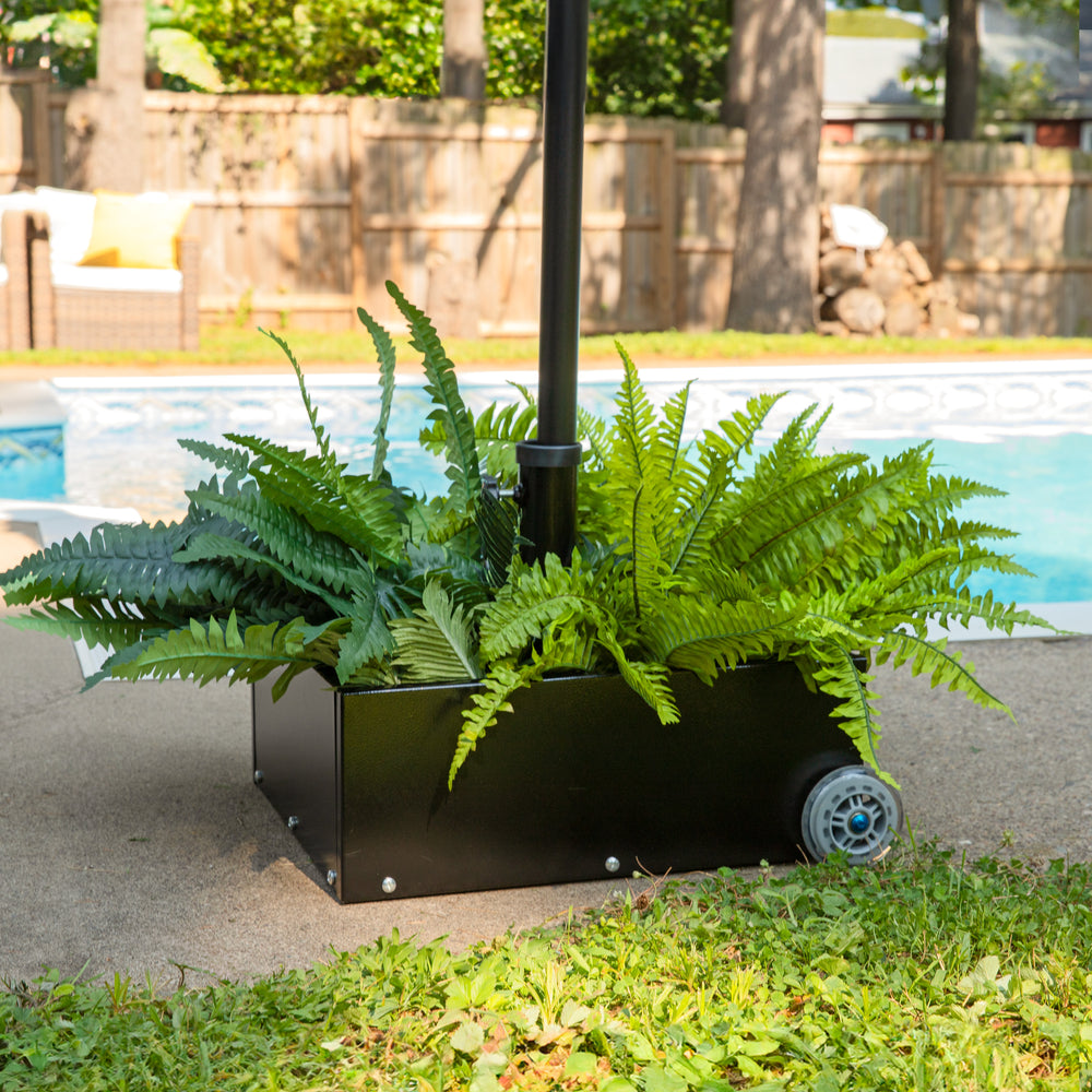 Sunnydaze Umbrella Stand Planter with Wheels Black lifestyle outdoor