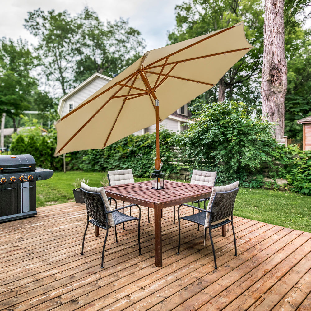 Sunnydaze 8.5 ft Solar Faux Woodgrain Patio Umbrella Beige lifestyle outdoor
